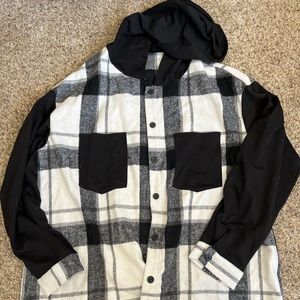 Never worn Lightweight black/white plaid button up size large but fits as an XL